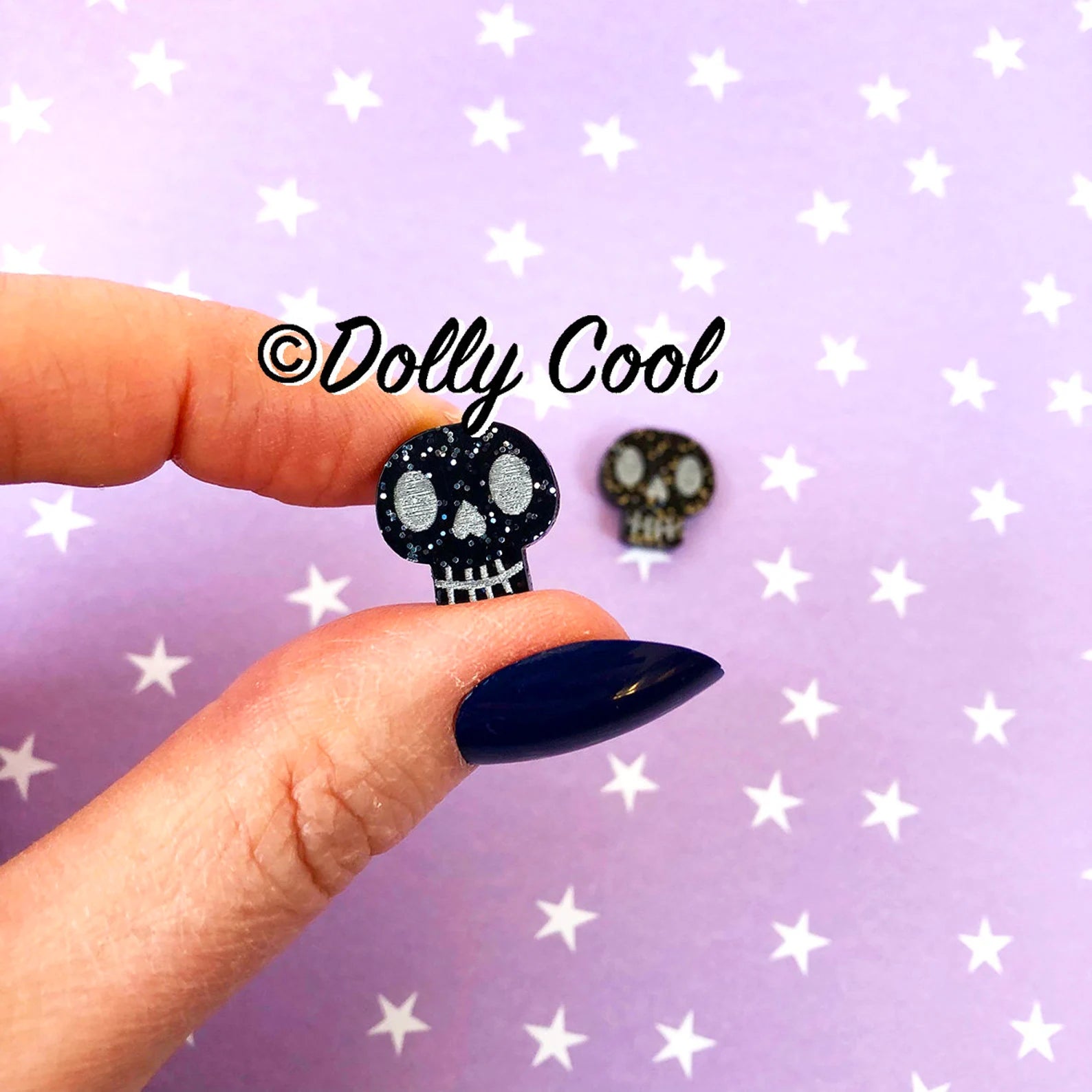 Black skull stud earrings